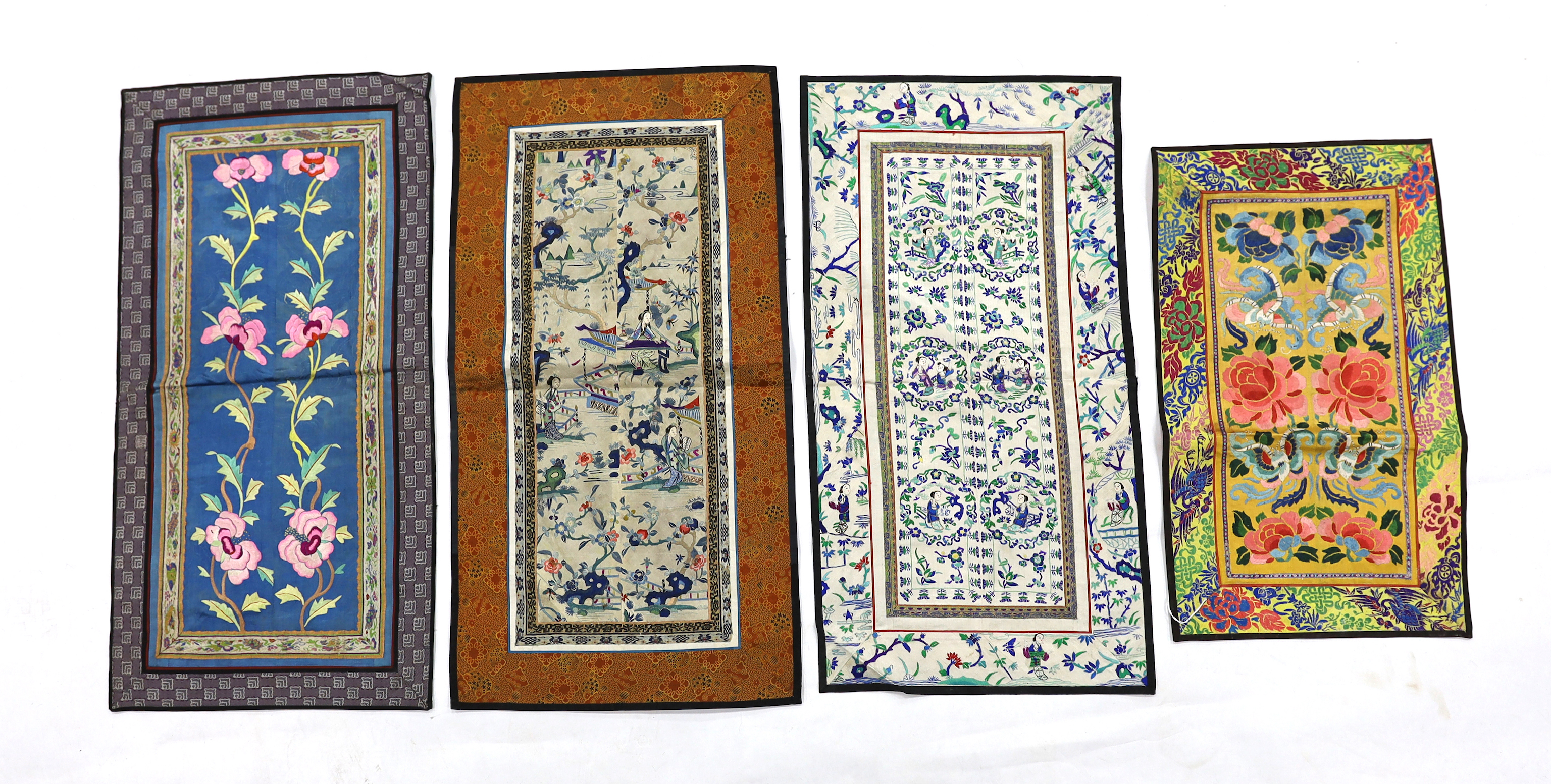 Four pairs of Chinese sleeve bands, two embroidered with figures on cream silk, a pair of floral embroidered on gold silk and the other polychrome flowers on blue silk, three with brocade borders, two largest 69cm high x